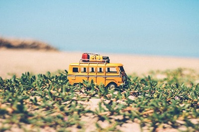 Miniature Adventure: Yellow Bus Journey